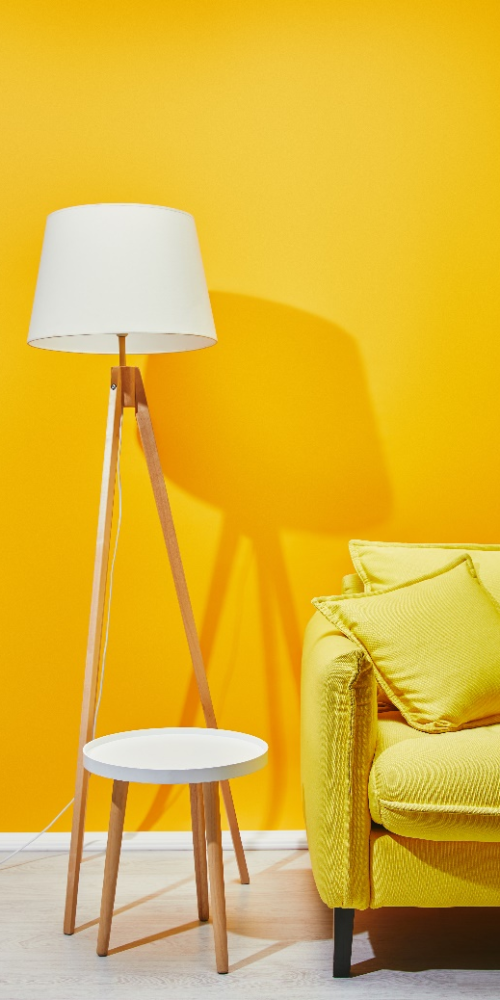 Yellow walls and floor lamp